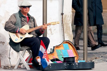 Grown Up Guitarist playing covers